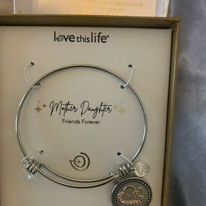 Mother daughter love this life brand bracelet.